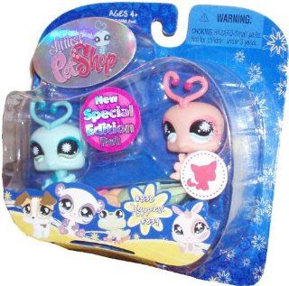Littlest Pet Shop Special Edition Pet Pairs Happiest Series Portable Collectible Figure Gift Set   Blue Lovebug (#838) and Pink Lovebug (#839) Plus Seesaw Accessory: Toys & Games