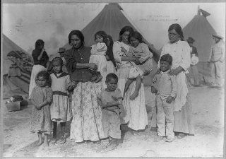 Mexican revolution, 1913 1914: women, children refugees in tent camp, standing   Prints