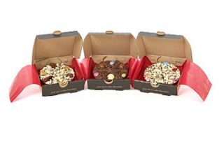 three mini chocolate pizzas by the gourmet chocolate pizza co.
