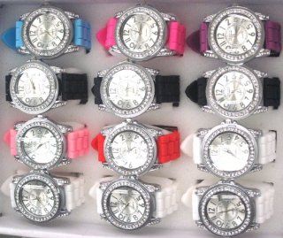 Set of ONE DOZEN 25% DISCOUNT When Compared to Buying Single. Silicone Rubber Gel Watch Link Look Ceramic Style Large Face with Crystal Bezel. MAKES A PERFECT GIFT FOR UNDER $10.00 FOR 12 SPECIAL PEOPLE. Includes 12 Pouches for Easy Gift Giving. Watches
