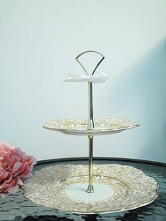elegant blue and gold vintage cake stand by teacup candles