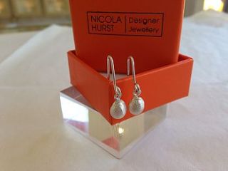 silver shell earrings by nicola hurst designer jewellery