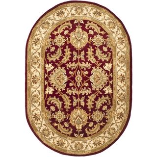 Handmade Heritage Kashan Red/ Ivory Wool Rug (46 X 66 Oval)