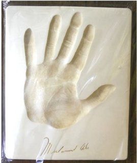 Muhammad Ali handprint real life full size. Ali personally impressed his hand into a soft clay tablet, then added his signature to the casting beneath his handprint: Sports & Outdoors