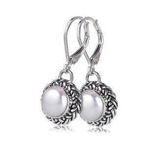 Sterling Silver These sterling silver white mother of pearl earrings by Sara Blaine are versatile enough to compliment your best power suit as well as your sassiest little black dress: Dangle Earrings: Jewelry